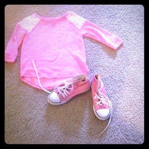 A pink sweaters shirt